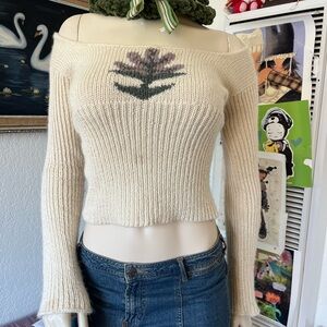 Off-Shoulder Cream Knit Sweater with Floral Accent